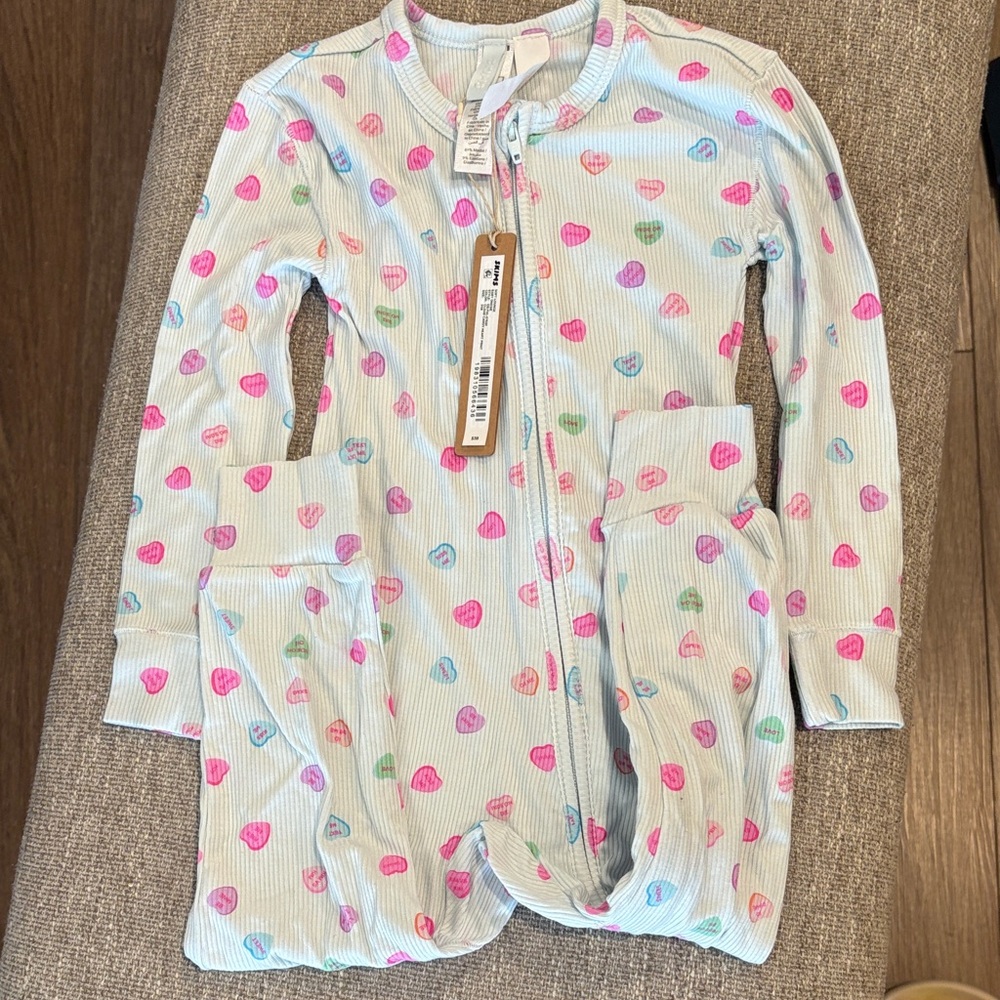 SKIMS cloud candy Heart Print baby onesie-perfect for Valentine’s Day